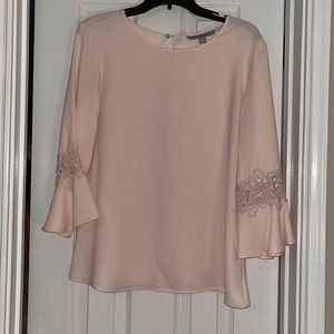 Blouse with flared sleeves
